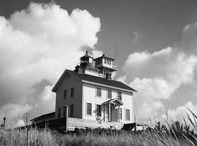 Yaquina Bay Light as it appeared in 1939. Just a few years after this image was made, a group of local residents would organize to save it from demolition.