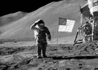 Commander Dave Scott salutes the U.S. flag, which has just been planted on the surface of the moon. A small piece of Oregon lava rock, carried to the moon by Scott's fellow astronaut Jim Irwin, lies within this photo, next to one of the many bootprints. (Image: NASA)