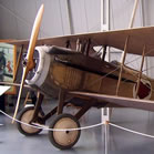 A French SPAD fighter plane parked in a museum. Chances are good this aircraft contains some Oregon spruce.