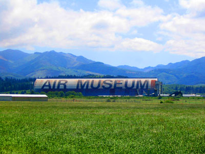 World War II-era blimp hangar near Tillamook, home of the Tillamook Air Museum, shares the title of "largest clear-span wooden building" with several other blimp hangars of the same design.