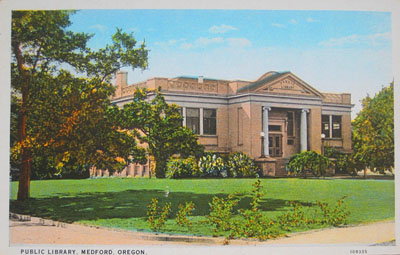 Carnegie public library, Medford, Oregon. Hand-tinted postcard view.