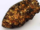 This hunk of pallasite came from the same 1820 meteor strike in Chile that many scientists believe was the source of the 'sample' Dr. John Evans claims he chipped off the Port Orford Meteorite when he found it. Was the meteorite a fraud? Many think so; others think not.